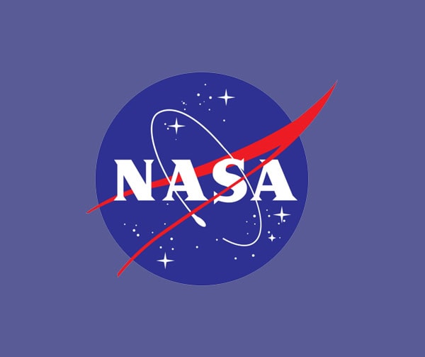The NASA logo featuring a blue circle with white stars, a red swoosh, and a white orbital path, with the letters NASA in bold white font across the center.